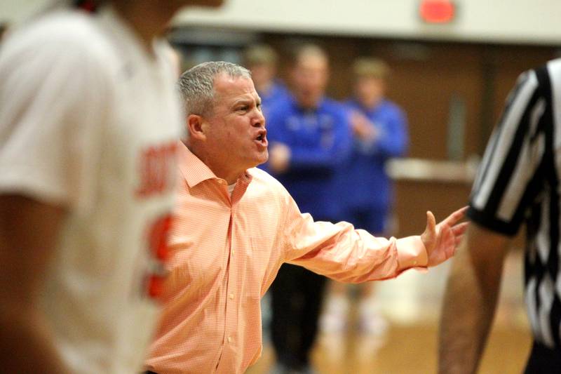 Wheaton Warrenville South Head Coach Mike Healy yells to his team during a game against Geneva in Wheaton on Friday, Jan. 27, 2023.