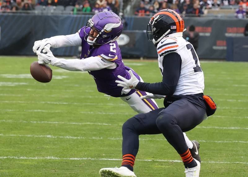 Minnesota Vikings cornerback Stephon Gilmore knocks the ball away from Chicago Bears wide receiver Keenan Allen during their game Sunday, Nov. 24, 2024, at Soldier Field in Chicago.