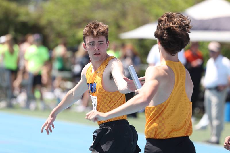 Lyons’ Nicholas Strayer takes the baton in the Class 3A 4x800 Relay State Finals on Saturday, May 27, 2023 in Charleston.