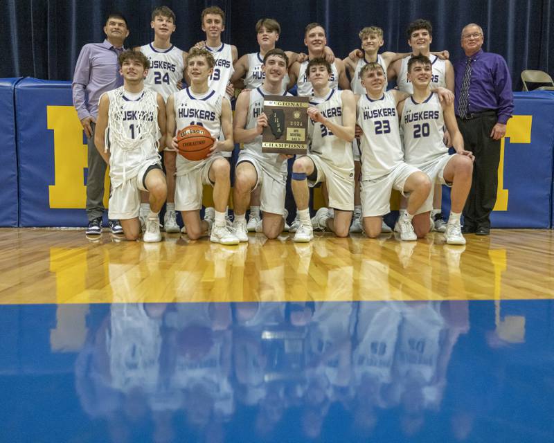 Serena High School athletes and coaches pose for photos after their IHSA 2A boys basketball regional championship win at Serena High School on February 23, 2024.