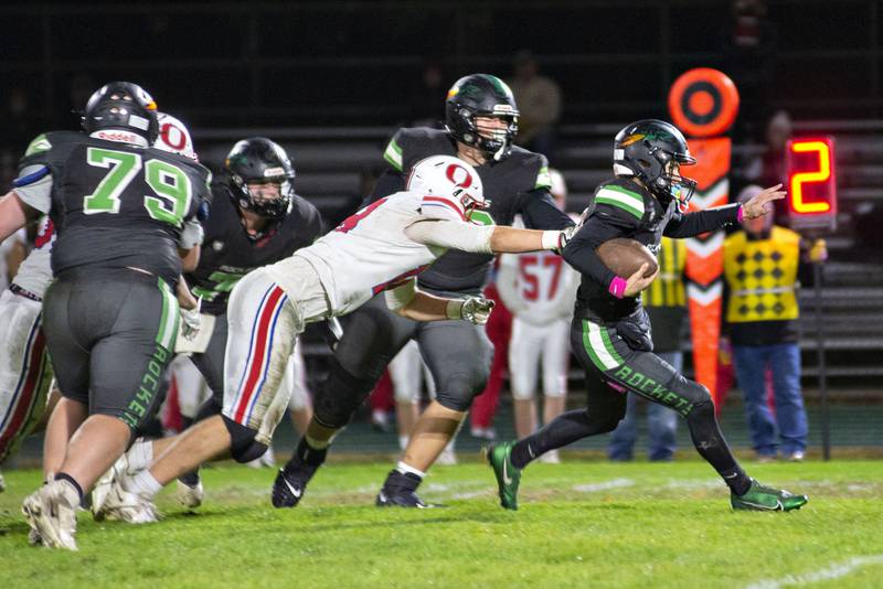 Rock Falls’ Kohle Bradley cuts through the middle against Oregon Friday, Oct. 14, 2022.