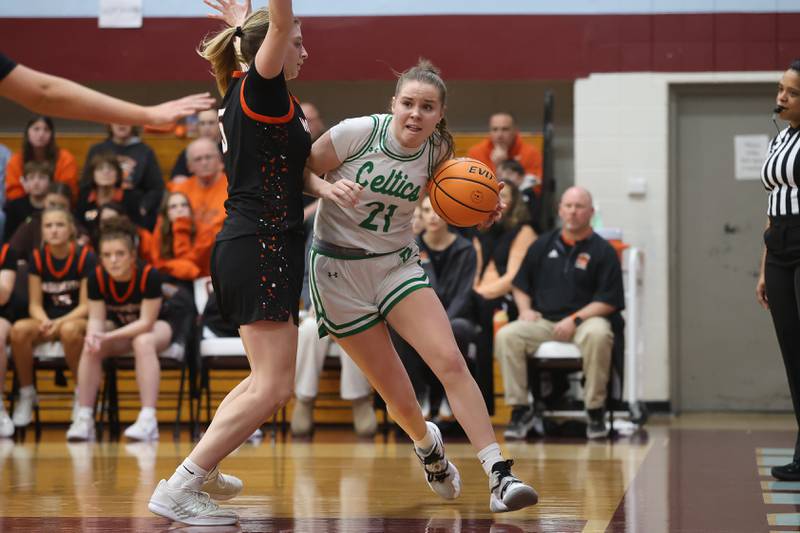 Providence’s Taylor Healy drives along the baseline against Washington in the Class 3A Kankakee Super-Sectional game on Monday, March 3, 2026 in Kankakee.