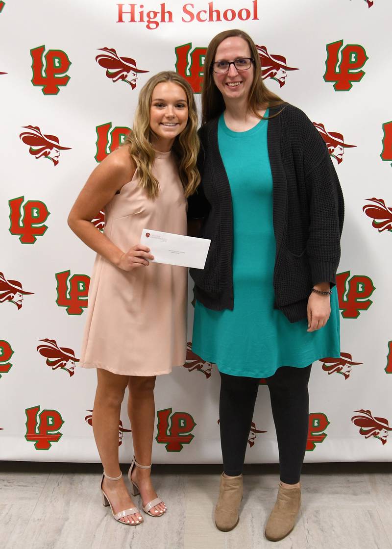 Mallory Freeman (left) received the Tonica Teachers’ Union Scholarship, presented by Heather Arbet (right). This scholarship is awarded to a La Salle-Peru High School senior who graduated from Tonica Elementary School District.
