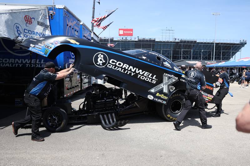 Austin Prock’s crew push out his car for the Funny Car quarterfinal race at the NHRA’s Gerber Collision and Glass Route 66 Nationals at Route 66 Raceway on Sunday, May 19, 2024 in Joliet.