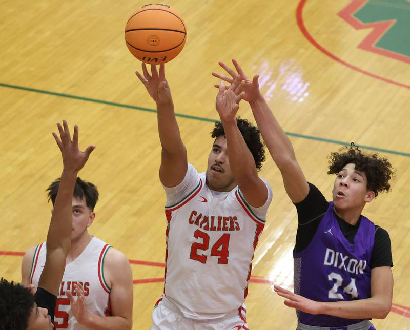 L-P's Marion Persich lets go of a jump shot over Dixon's Armahn McGowan during the Class 3A Regional semifinal game on Wednesday, Feb. 25, 2026 in Sellett Gymnasium at L-P High School.