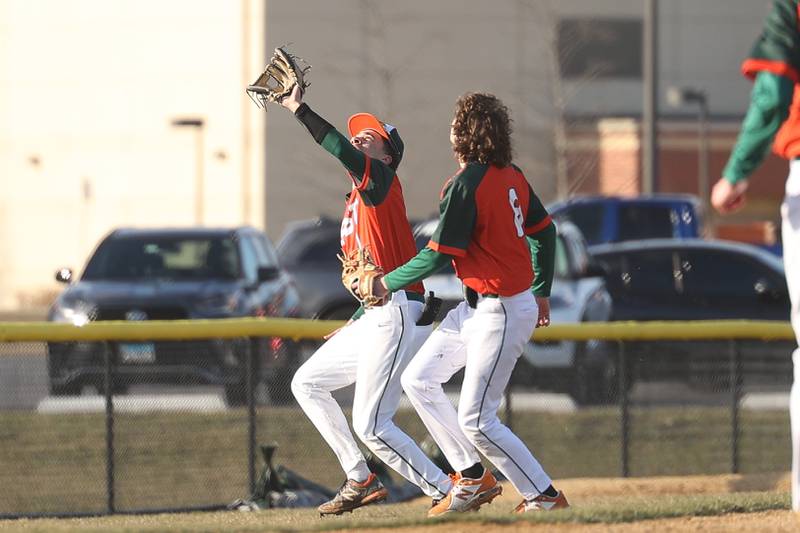 Plainfield East’s Tayden Washington runs down the foul ball against Bolingbrook on Monday, March 27, 2023.