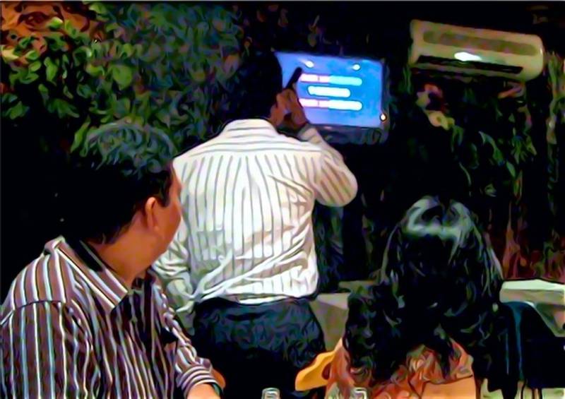 (File photo of man singing karaoke)