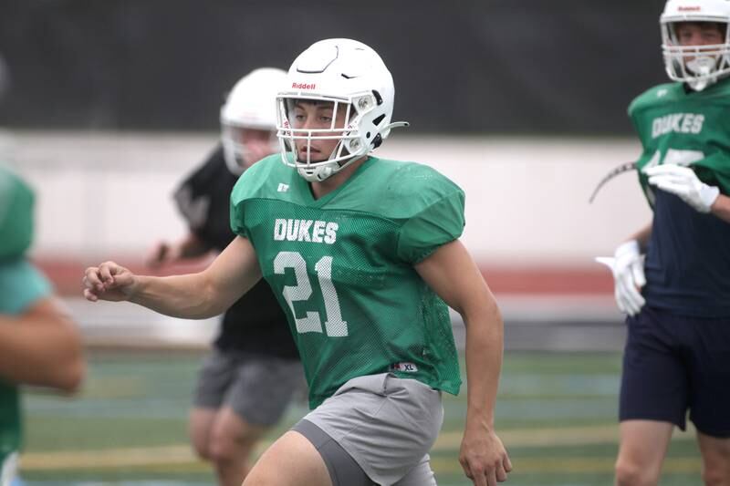York’s Cole Ostendorf runs a drill during practice at the Elmhurst school on Wednesday, Aug. 9, 2023.