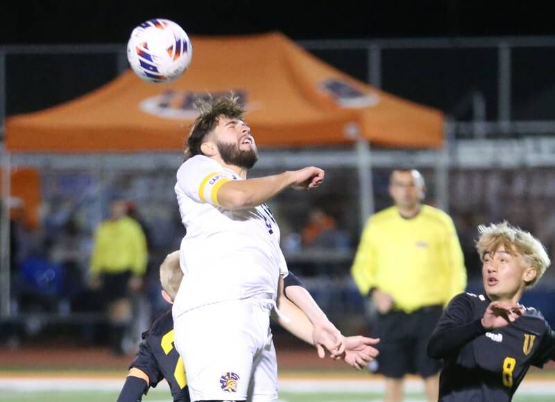 Mendota's David Casas beats out Normal U-High's Reed Kawikita to a header during the Class 1A State semifinal game on Thursday, Nov. 7, 2024 at Hoffman Estates High School.