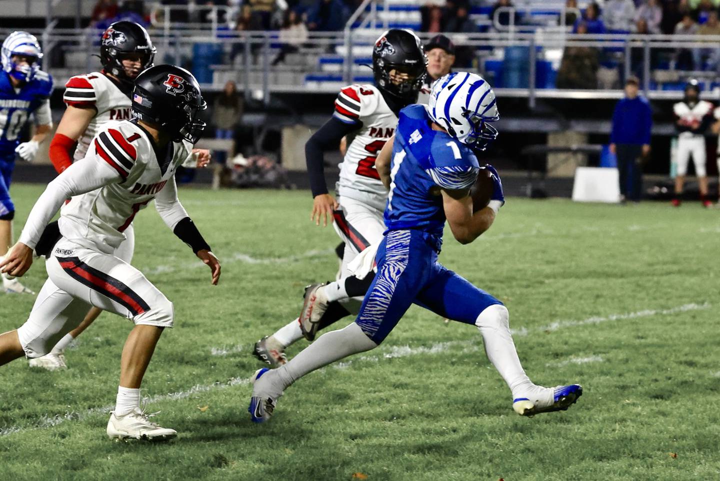 Princeton's Casey Etheridge runs the ball during the Tigers' 48-0 win over Erie-Prophetstown on Friday, Oct. 24, 2025 at Bryant Field in Princeton.