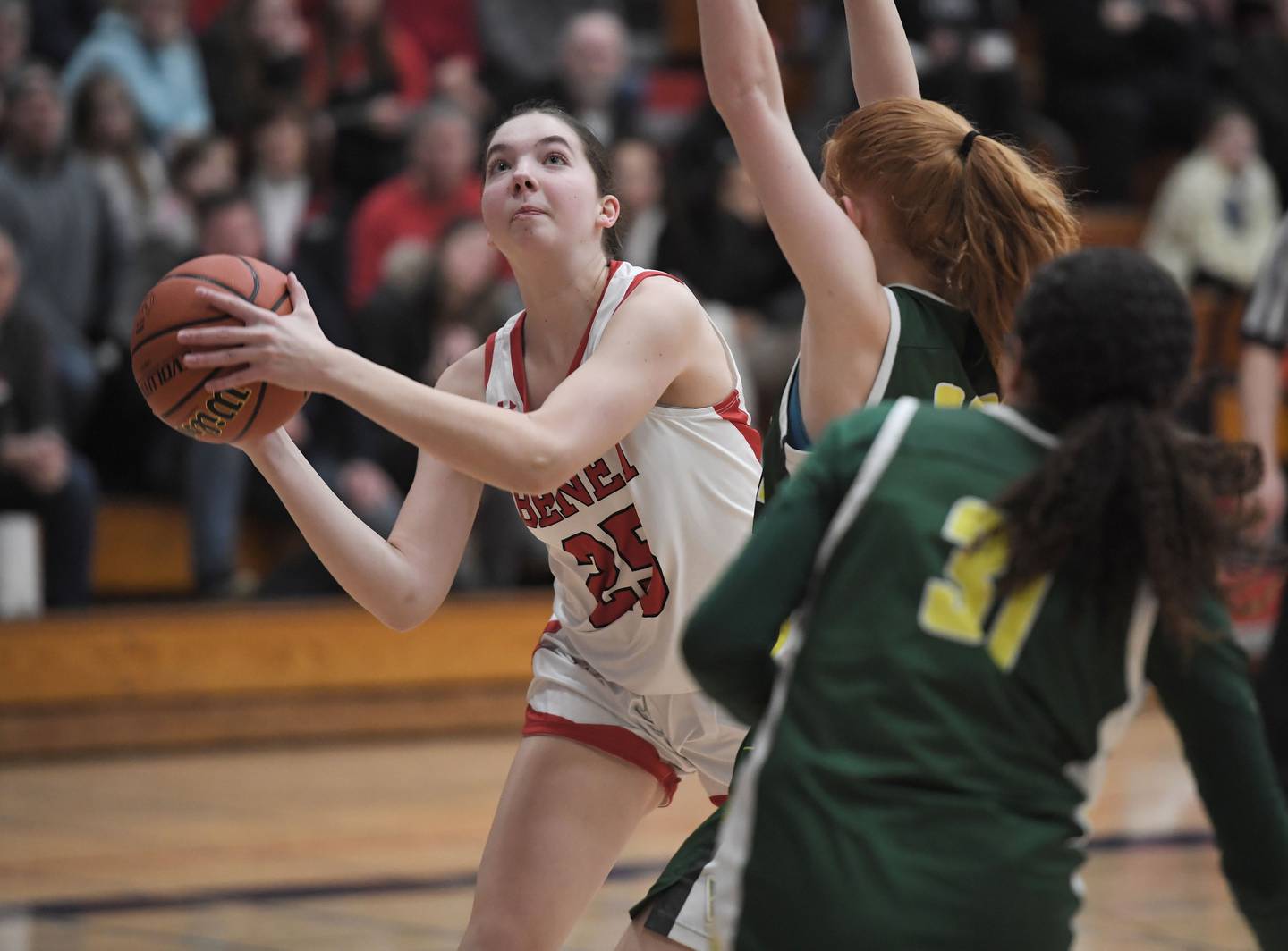 Benet’s Emilia Sularski tries to shoot against Waubonsie Valley’s Danyella Mporokoso and Hannah Laub in the Class 4A West Aurora girls basketball all sectional championship game in Aurora on Thursday, February 23, 2023.