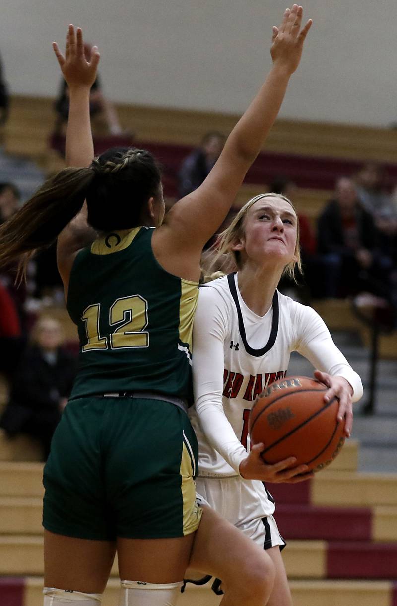 Huntley's Anna Campanelli, right, drives to the basket against Boylan's Alayna Petalber during a Dundee-Crown Thanksgiving Girls Basketball Tournament basketball game Wednesday, Nov.. 16, 2022, between Huntley and Boylan at Huntley High School.