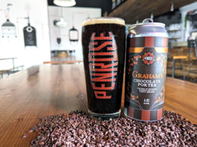 Penrose Graham’s Chocolate Porter pours a rich, velvety brown, immediately captivating with an irresistible aroma of roasted malt and chocolate that envelops your senses.