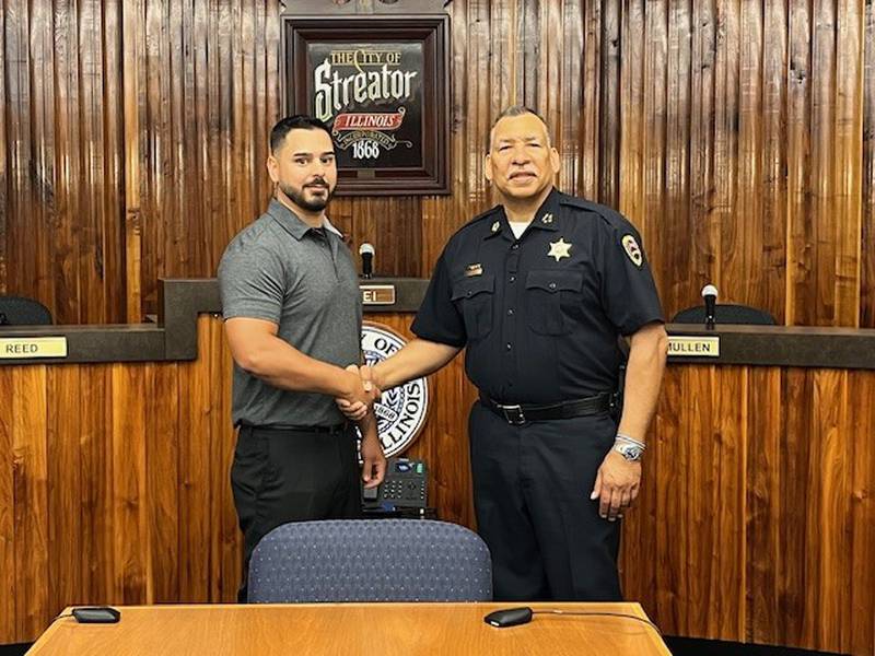 Streator's Police Department's latest hire, Shayne Shuler with Chief John Franklin. Shuler was sworn in at Streator's Police Department on August 5, 2024. (Photo provided by Streator Police Department's Facebook)