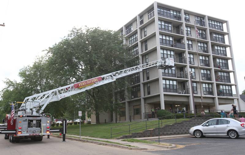 Peru firefighters respond to the scene of a fire at the Housing Authority for La Salle County (Peru Hi-Rise) on Tuesday, June 17, 2025 in Peru. The fire happened shortly after 6p.m.