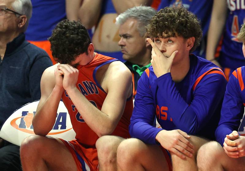 Eastland players watch the final seconds tick away during their IHSA Class 1A state championship loss to Chicago Hope Academy Saturday, March 15, 2025, in the State Farm Center at the University of Illinois in Champaign.