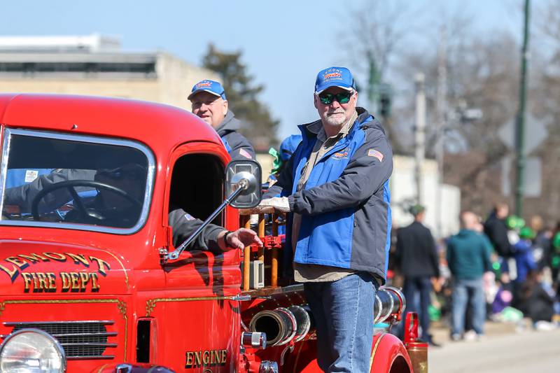 An antique Lemont fire engine is driven in the Lemont St. Pat's Day Parade on Saturday, March 8, 2025  in Lemont.