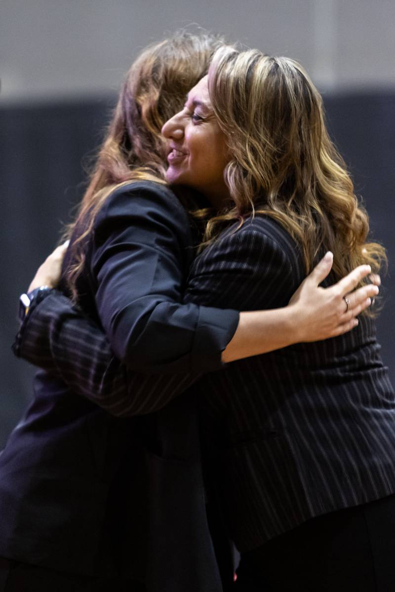 Dr. Jaclyn Lennox, Bolingbrook High School’s assistant principal of curriculum and instruction, hugs Bolingbrook Mayor Mary Alexander-Basta after winning the Milken Educator Award during a surprise assembly at Bolingbrook High School on Oct. 16, 2025.