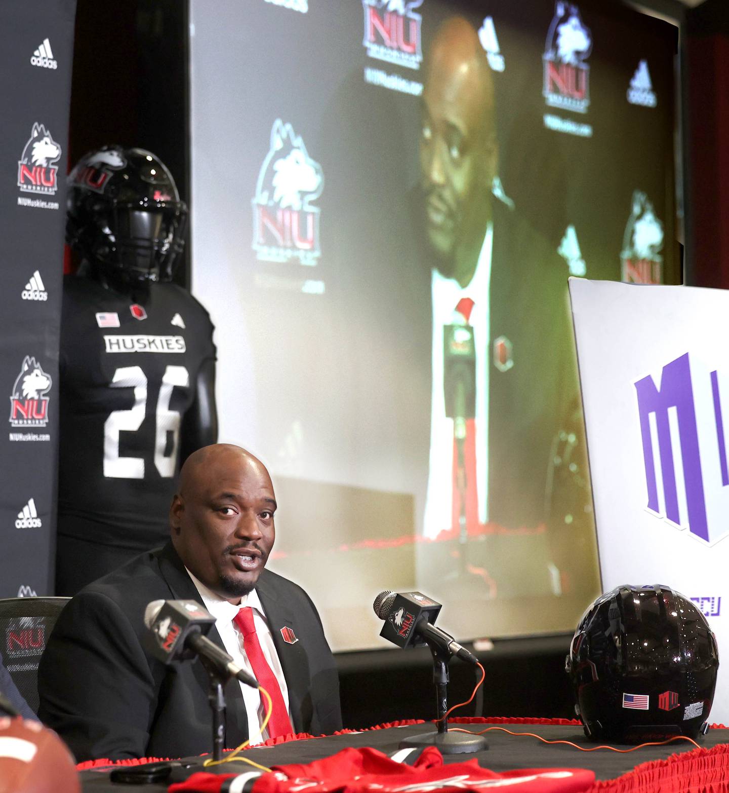 Northern Illinois University head football coach Thomas Hammock answers a question during a press conference Tuesday, Jan. 7, 2025, announcing that NIU football will be joining the Mountain West Conference starting with the 2026 season.