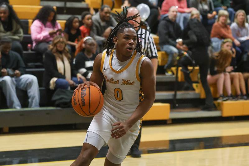 Joliet West’s Aamir Shannon looks to make a play against Joliet Central on Tuesday, Feb. 17, 2026 in Joliet.