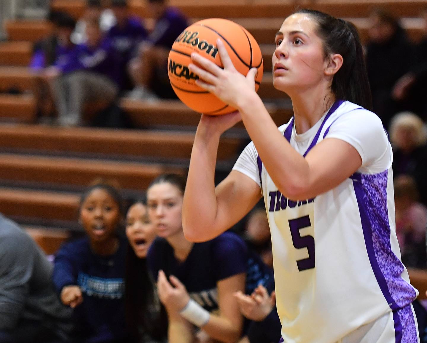 Downers Grove North’s Campbell Thulin shoots for three points during a game against Downers Grove South on December 20, 2025 at Downers Grove North High School in Downers Grove.