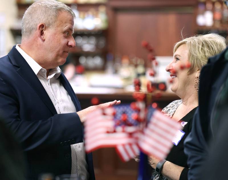 Cohen Barnes, DeKalb mayor and candidate for the democratic nomination for the 76th district seat in the Illinois House of Representatives, talks to a supporter Tuesday, March 19, 2024, during his election night party at Faranda’s in DeKalb.