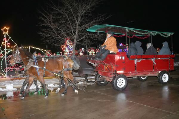 Photos: Carriage rides offer magical tour through Celebration of Lights in La Salle. 
