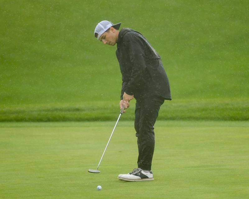 Downers Grove South’s golfer Jack Chrastka putts during the West Suburban golf match on Tuesday Sept. 24, 2024, held at Prairie Bluff Golf Course in Crest Hill.