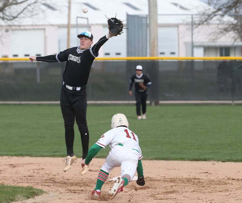 Kaneland shortstop Johnny Spallasso misses a throw to second base as L-P's Adrian Arzola gets a stolen on Wednesday, April 5, 2023 at Dickinson Field in Oglesby.
