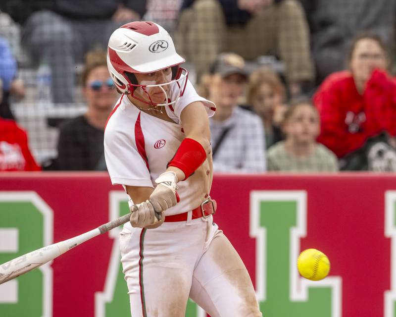 LaSalle Peru's Callie Murtis connects for a single against Ottawa High School at the L-P Athletic Complex on April 22, 2024.