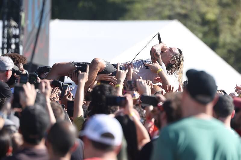 Jami Morgan of Code Orange crowd surfs during his performance on the Roots Stage on day one of Riot Fest, Friday, Sept. 15, in Chicago.