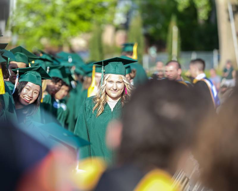 Students take their seats during the Glenbard West High School graduation ceremony. May 19, 2022
