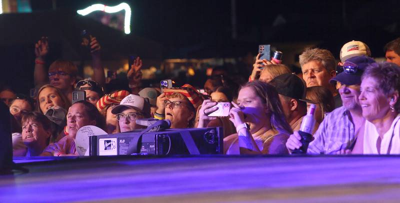Fans sing along as Trace Adkin performs on Thursday, Aug. 21, 2025 at the Bureau County Fair in Princeton.