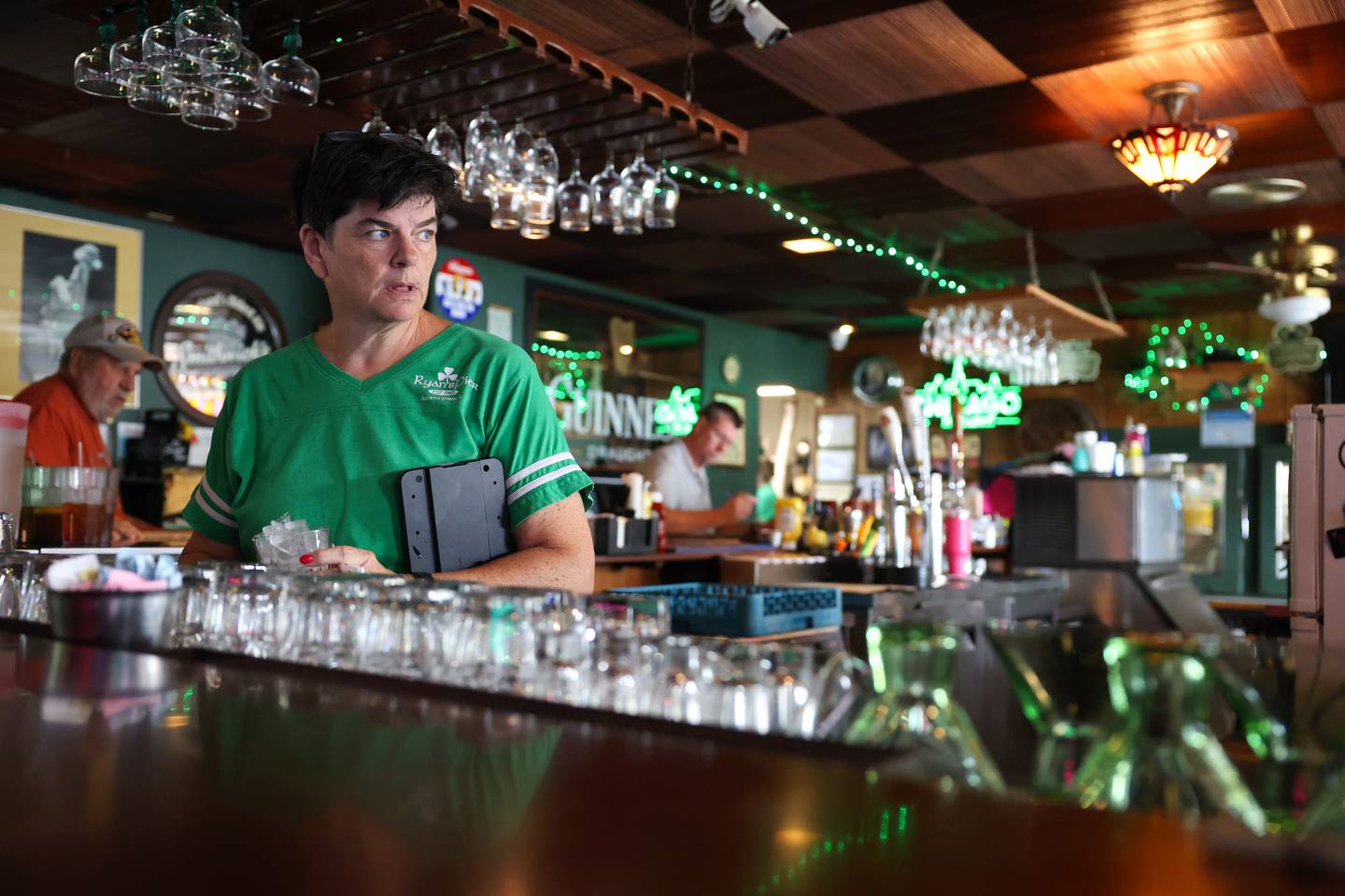 Kathleen Slavin, co-owner of Ryan's Pier, takes a customer's order during the lunch rush on Tuesday, Aug. 12, 2025, at the Aroma Park business. The restaurant has been celebrating its 40th anniversary this year.