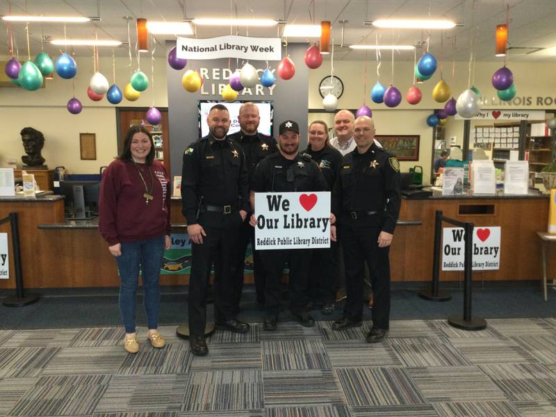 Members of the Ottawa Police Department visit Reddick Library on Monday, April 7, 2025, to kick off National Library Week.