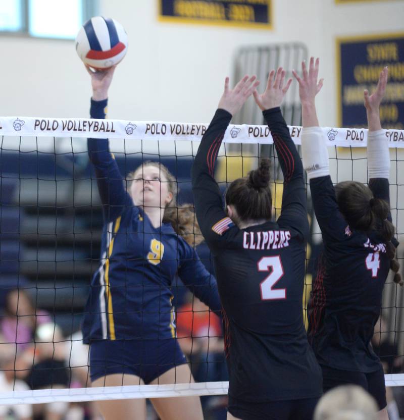Polo's Reese Mekeel directs the ball over the net past Amboy's Kiera Karlson (2) and Lili Leffelman (4) at the Polo Invite on Saturday, Sept. 27, 2025.