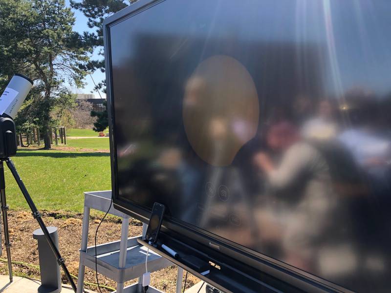 The solar eclipse starts to appear on the screen of Paul Hamill's telescope on the campus on McHenry County College on April 8, 2024. Hamill is a meteorologist and science instructor at MCC.