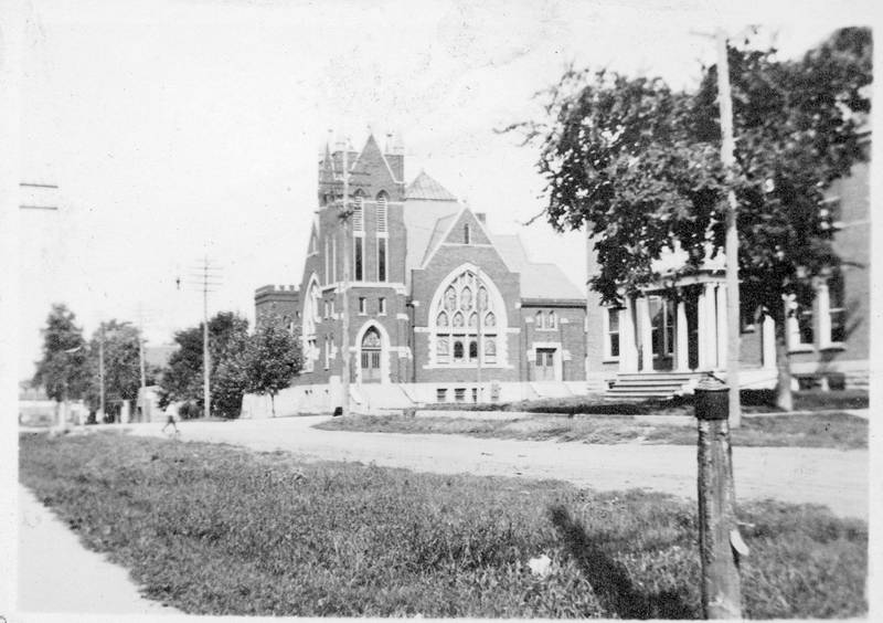 The old Sycamore Hospital and the Methodist Church on Elm Street looking northwest toward Somonauk Street, circa 1912.