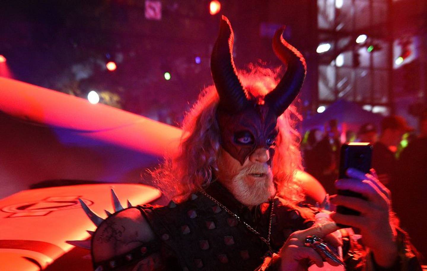 Everyone has time for selfies during Nightmare on Chicago Street in downtown Elgin Saturday.