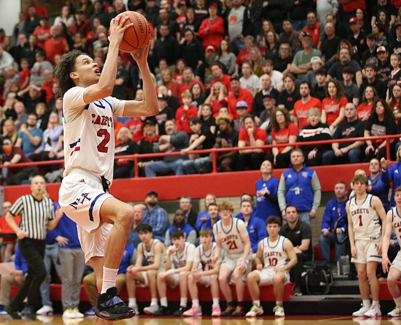 Marmion's Jabe Haith runs in all alone to score on a layup against Metamora during the Class 3A Super-Sectional on Monday, March 6, 2023 at Ottawa High School.