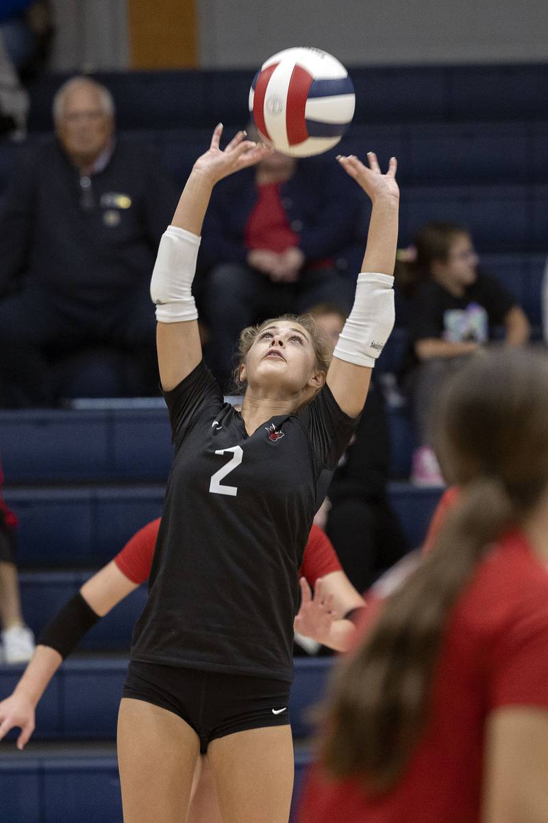 Hall’s Evelyn Bryant sets the ball against Newman Tuesday, Oct. 21, 2025.