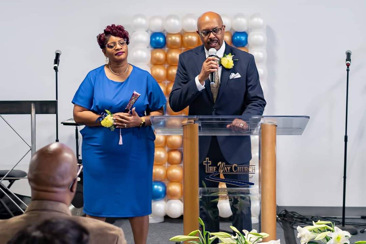 The Way of Church of Joliet held its eighth anniversary on Sunday, April 10, 2022, where members suprised their pastor Rev. Edward L. Winfrey Jr. with a gift: a new podium with The Way Church of Joliet inscribed on it. Winfrey's wife Michelle is also pictured.