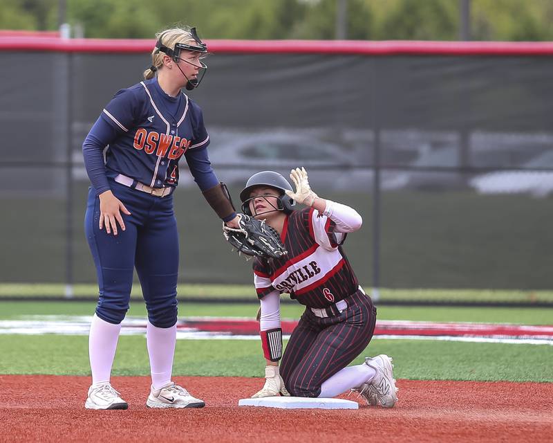Yorkville's Alyssa Muhlbach (6) comes up after sliding in safely at second during softball game between Oswego at Yorkville. May 5, 2026 in Yorkville.