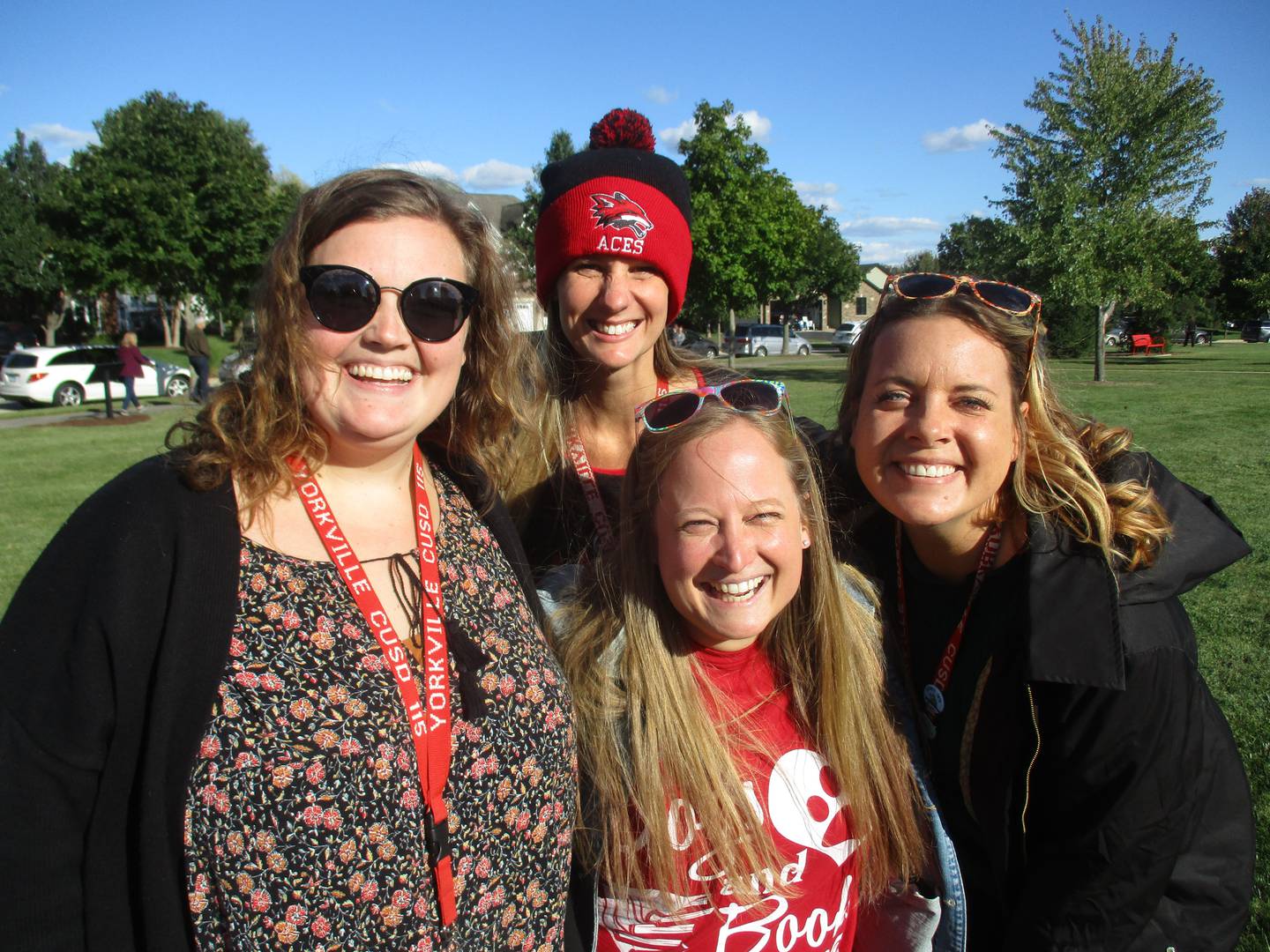 Yorkville School District Y115 Book Ambassador Steph McHugh, front and center, worked with fellow district librarians on the storywalk project. They include, from left, Courtney Voogt of Autumn Creek Elementary, Nichole Martinez of Yorkville Grade and Bristol Grade Schools and Mary Hamer of Grande Reserve. They were celebrating the storywalk opening on Sept. 27, 2022.