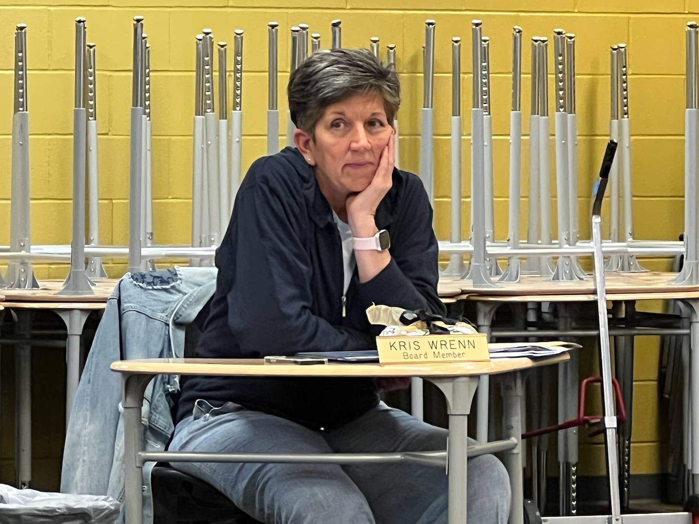 School board member Kris Wrenn listens to speakers during the Sycamore District 427 board of education meeting Sept. 27, 2022.