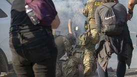 Tear gas used amid protest at suburban ICE facility; congressional candidate pushed to ground