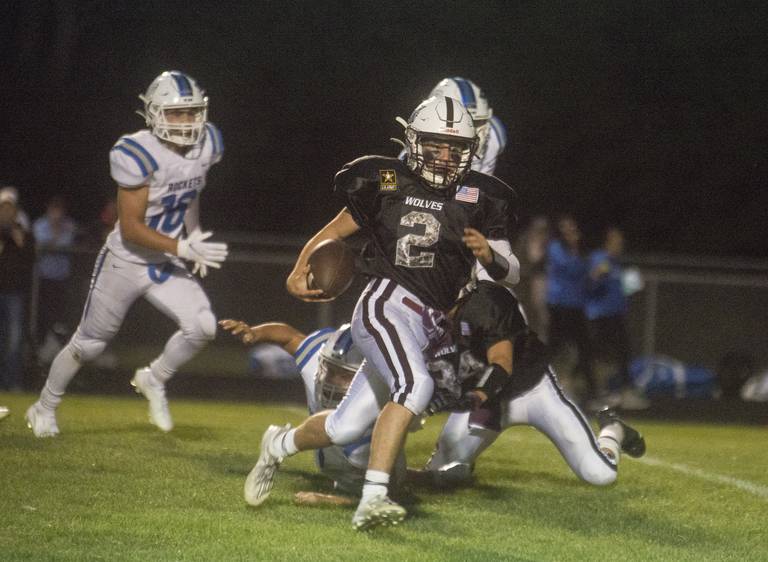 Prairie Ridge's Mason Loucks scampers for a touchdown in the second quarter against Burlington Central in a Fox Valley Conference game Friday, Sep. 3 in Crystal Lake.