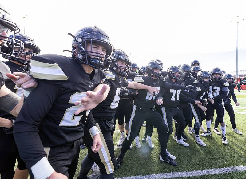 Lena-Winslow celebrates their 58-13 victory over Brown County Friday, Nov. 28, 2025, in the Class 1A football finals at Hancock Stadium at ISU.