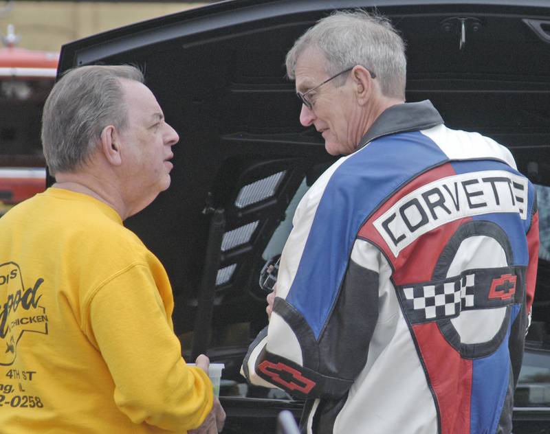Joe Schmitt and Dan Jones discuss cars at Sterling Main Street's 12th Annual Car Show on Sunday, May 4, 2025.