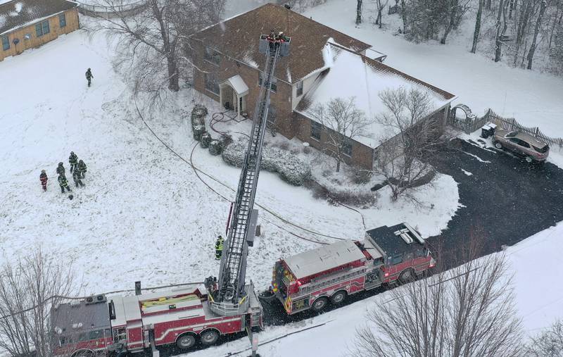 Firefighters work the scene of a structure fire on Friday, Jan. 10, 2025 at a residence located in the 2500 bock of East 1569th Road (Covel Bluff Lane) in Ottawa. The fire was upgraded to the second alarm. Firefighters from Oglesby, Utica, Grand Ridge, Marseilles, Tonica and others assisted with the fire.